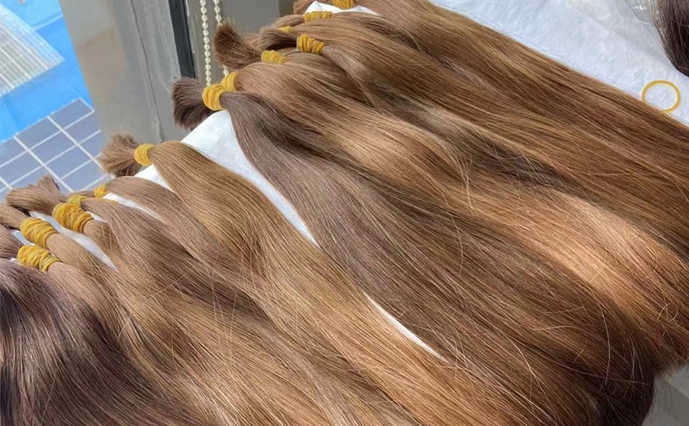 Quality control checkpoints in tape-in hair extension production ensure consistent standards